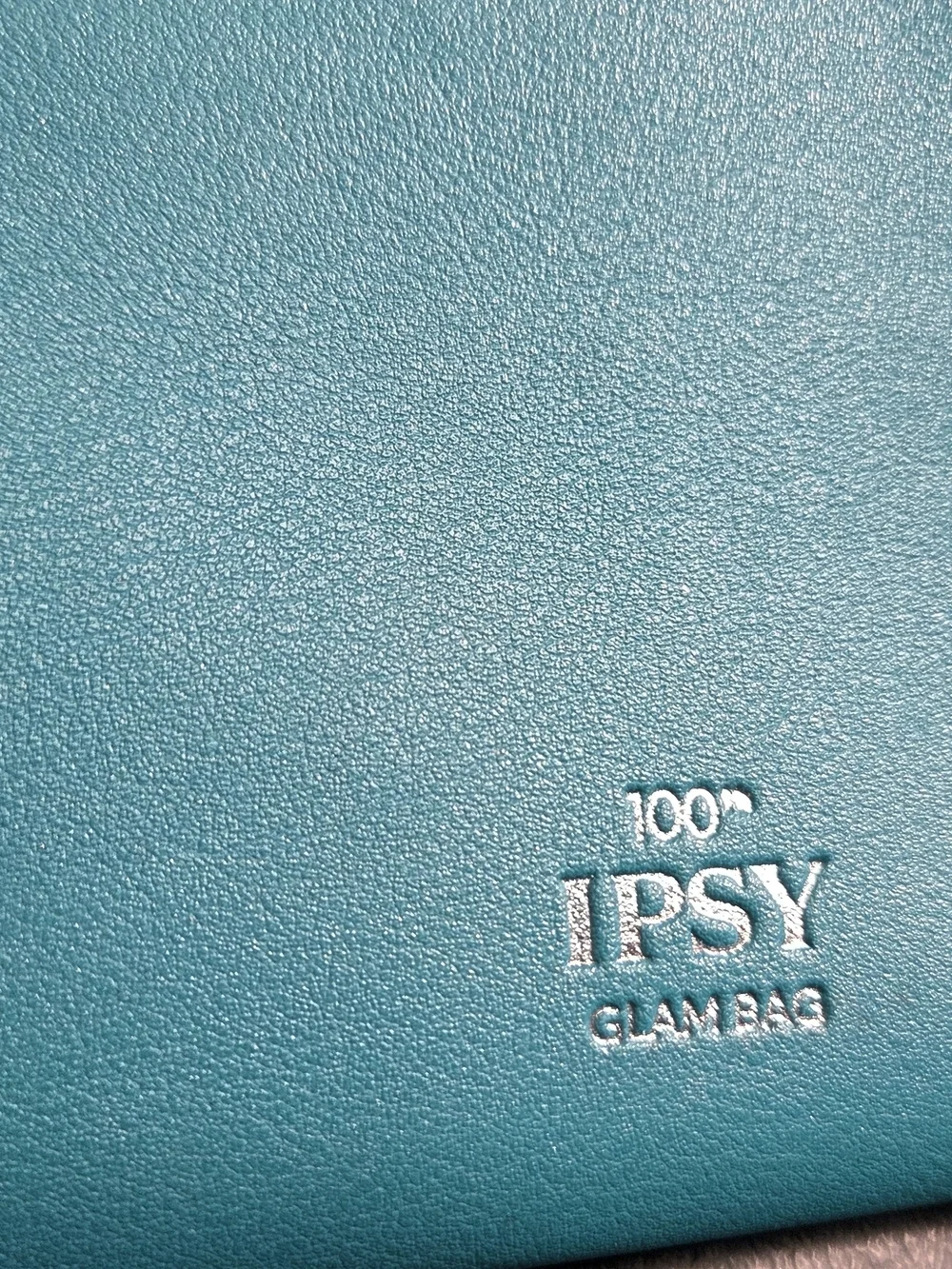 ipsy Turquoise Studded Cosmetic Pouch with Yellow Tassel